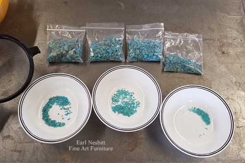 Earl separates turquoise by size and color for inlay